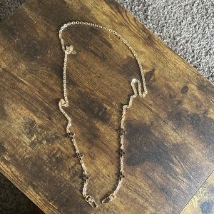 Gold and black unbranded crossbody/purse chain.